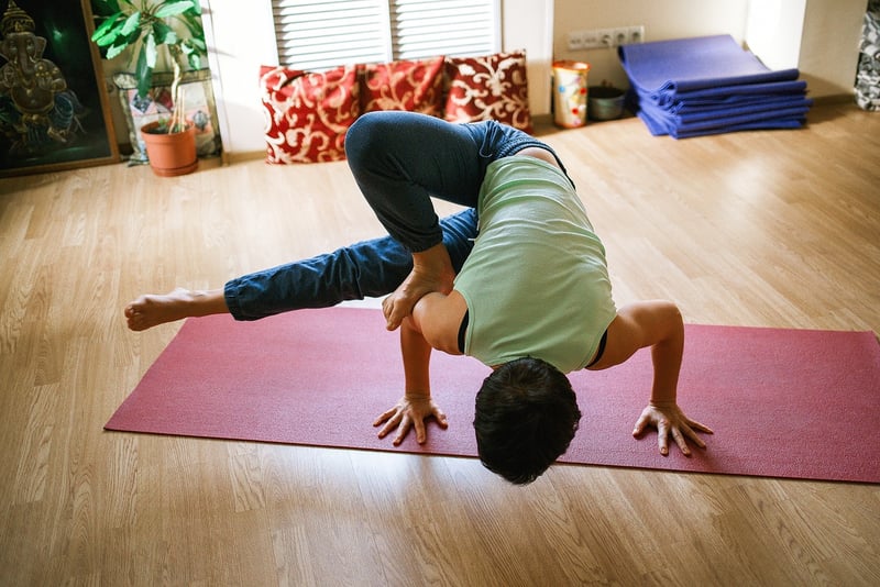 Woman practicing restorative yoga